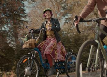 Woman cycling on a tricycle