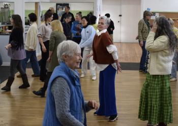 People gathered in a dance studio